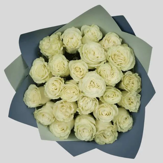 Elegant Ecuadorian white roses with large, fragrant blooms arranged for luxury flower delivery in Dubai.