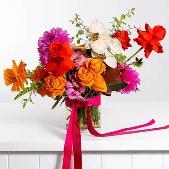Radiant Charm Bouquet with soft-toned roses, lisianthus, and pink accents