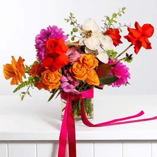 Radiant Charm Bouquet with soft-toned roses, lisianthus, and pink accents