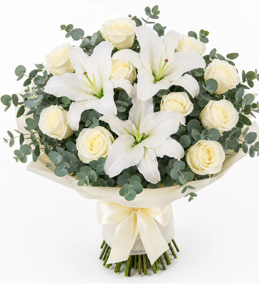 White lily and rose sympathy bouquet Dubai — condolence flowers by Goshen Flower