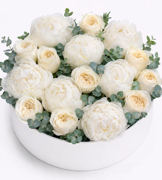 White peony and rose condolence box arrangement Dubai — sympathy flowers by Goshen Flower