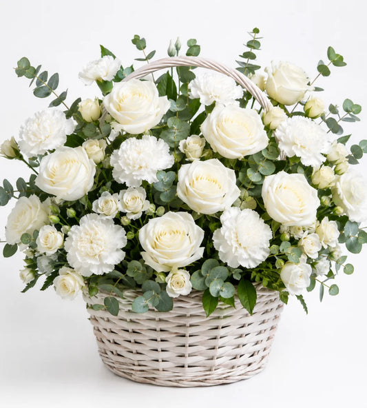White flower basket arrangement Dubai — condolence flowers delivered by Goshen Flower