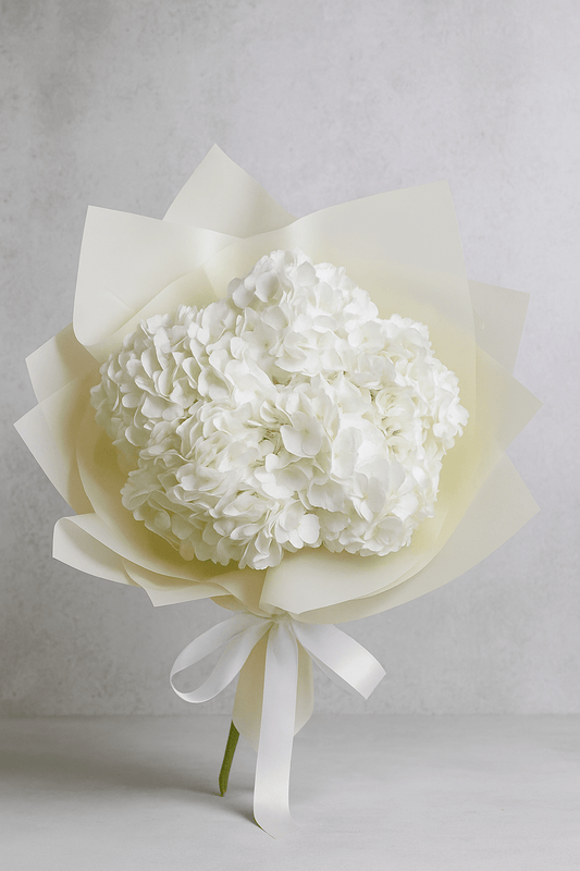Elegant bouquet of white hydrangeas from Goshen Flower, hand-tied and available for same-day delivery in Dubai.