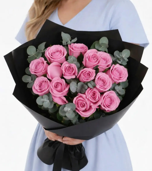 Buy pink roses Dubai — Luxury 12 pink roses bouquet in elegant satin box with silk ribbon, same-day delivery available across Dubai and UAE