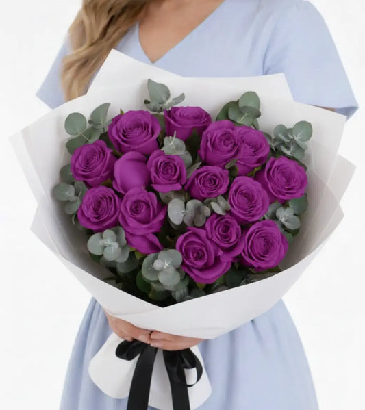 Buy purple roses Dubai — Luxury 12 purple roses bouquet in elegant satin box with velvet ribbon, same-day delivery available across Dubai and UAE