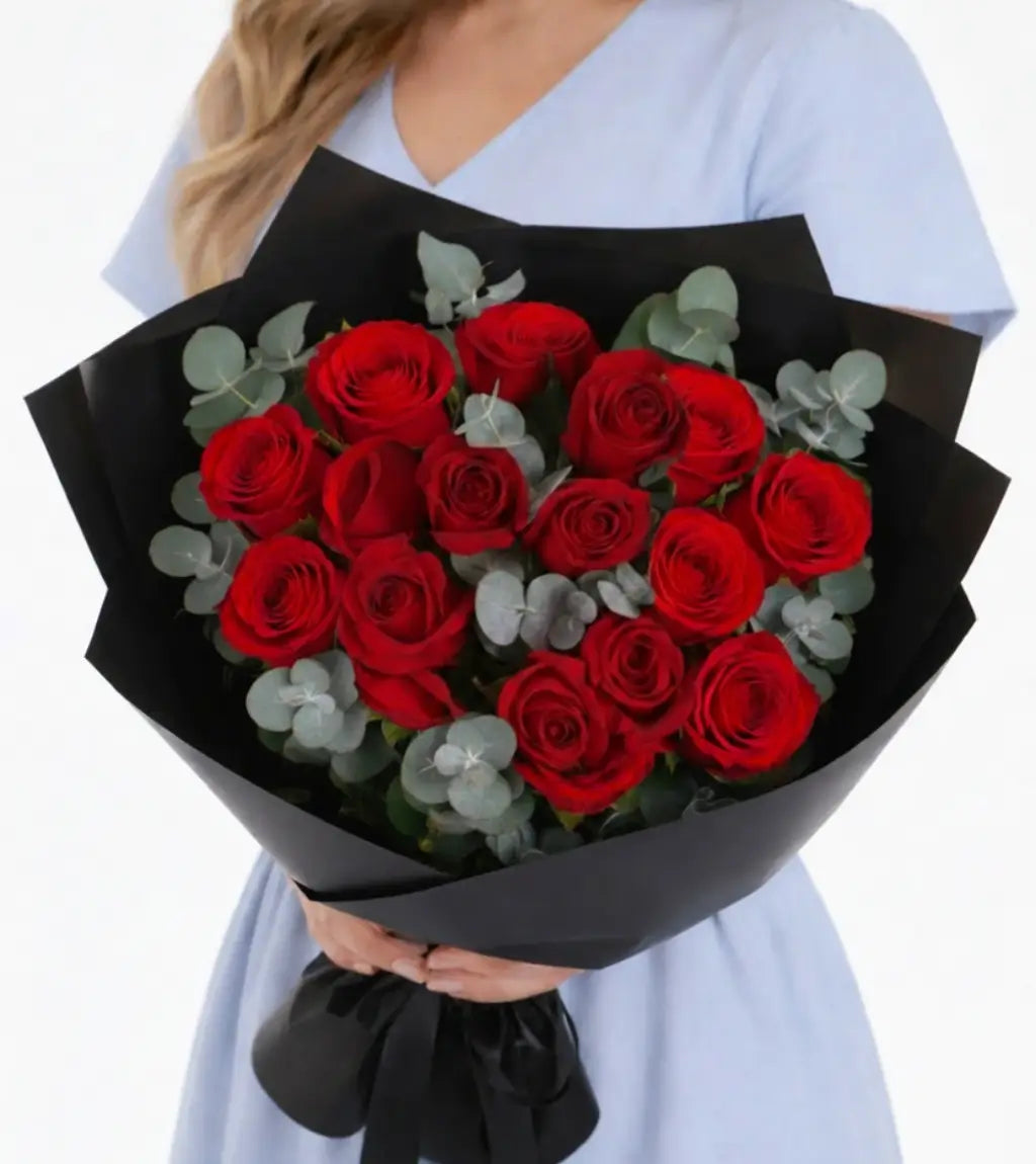 Buy red roses Dubai — Luxury 12 red roses bouquet in elegant satin box with silk ribbon, same-day delivery available across Dubai and UAE