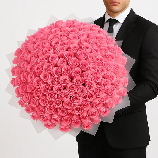 Luxurious bouquet of 200 pink roses wrapped in elegant paper, available for flower delivery in Dubai