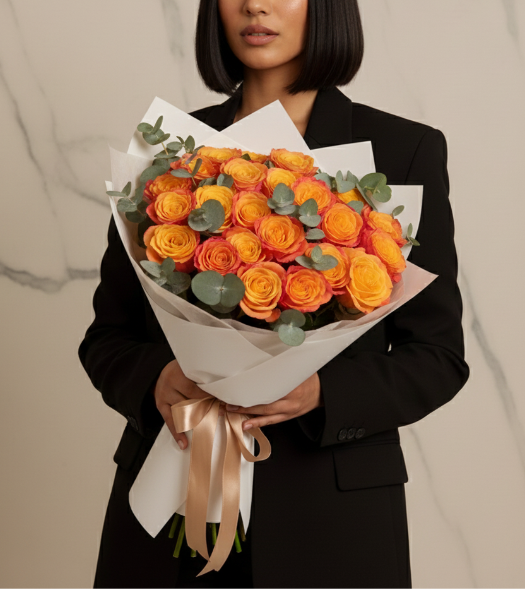 Orange roses delivery Dubai — 24 vibrant tangerine orange roses in a luxury satin gift box, same-day flower delivery across Dubai and UAE
