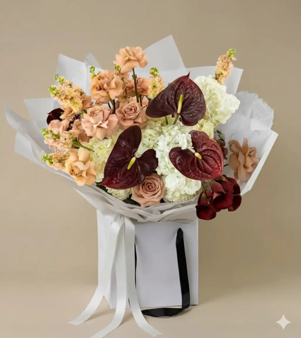 Golden Grace Bouquet with peach roses, hydrangeas and burgundy anthuriums – luxury flower bouquet by Goshen Flower Dubai