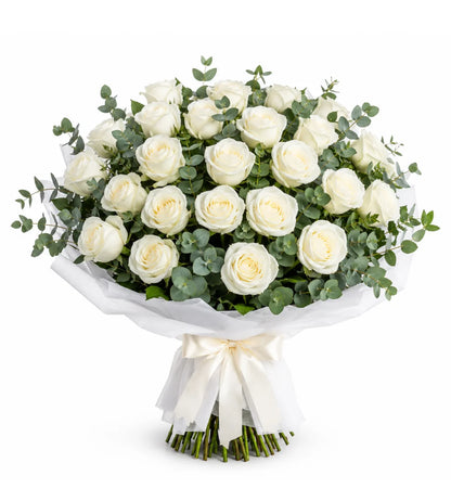 White rose condolence bouquet Dubai — 20 premium Holland roses with eucalyptus by Goshen Flower