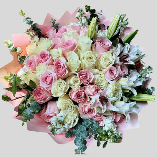 You Are Mine Bouquet with blush roses, white lilies, and eucalyptus – perfect for romantic flower delivery in Dubai