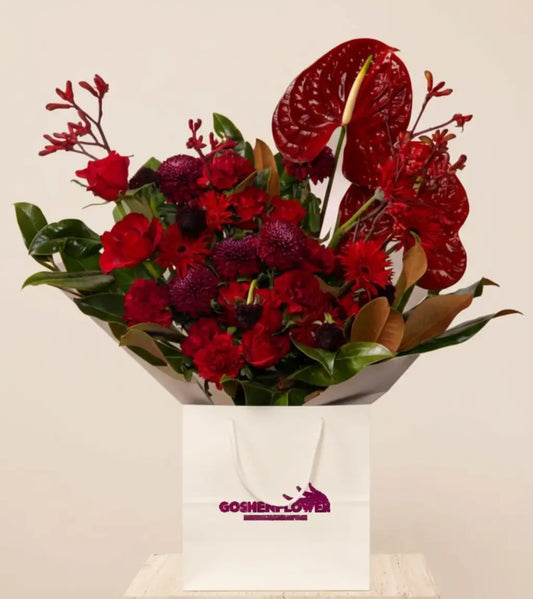 Luxury dark red flower bouquet with roses, anthurium, and carnations – Berlin Bouquet by Goshen Flower Dubai
