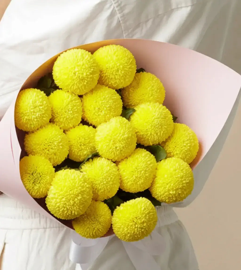 Yellow ping pong chrysanthemum bouquet hand‑tied in Dubai