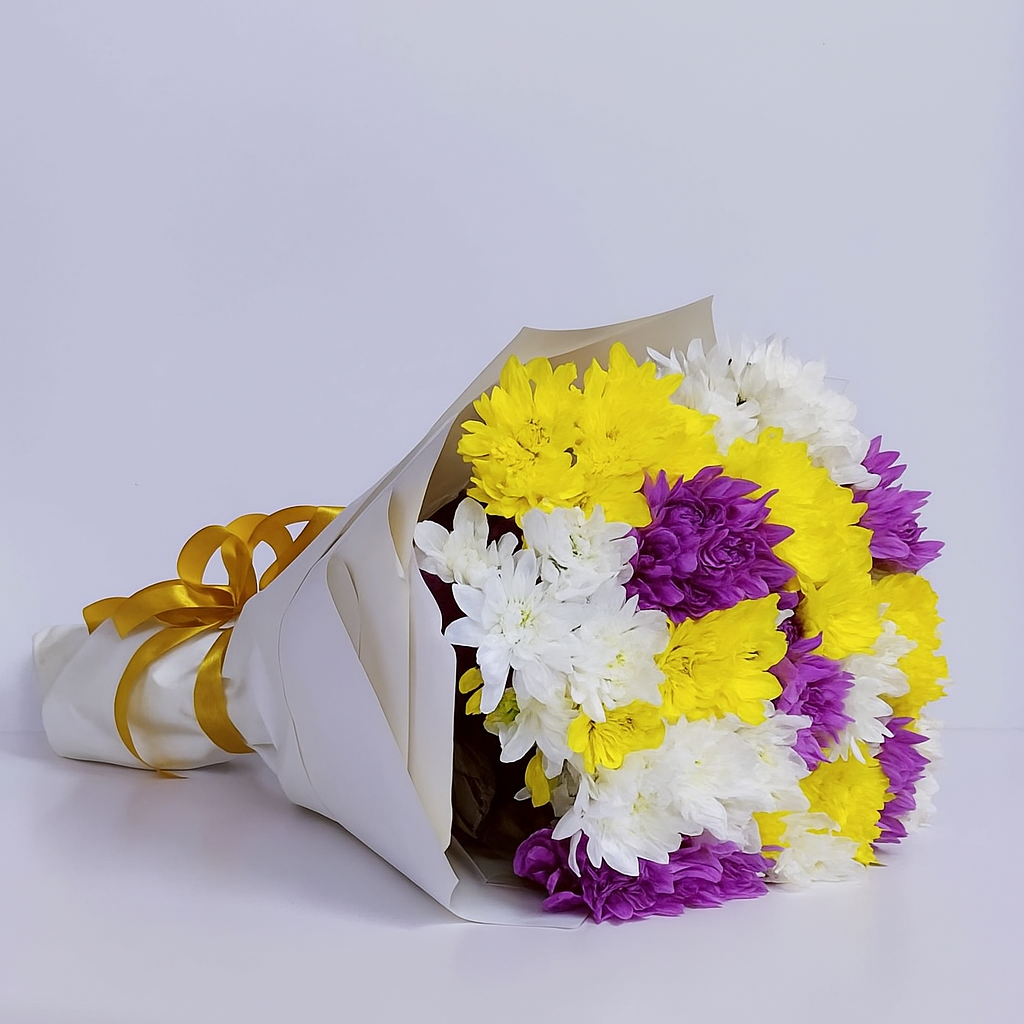 Mixed chrysanthemum bouquet with white, yellow, and purple blooms, hand-arranged by Goshen Flower in Dubai.