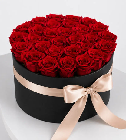 30 red roses matte black medium hat box champagne ribbon luxury flowers Dubai