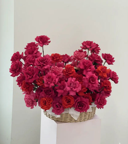 Rose Couture Basket with premium pink and red roses arranged in a luxury woven basket – flower delivery Dubai