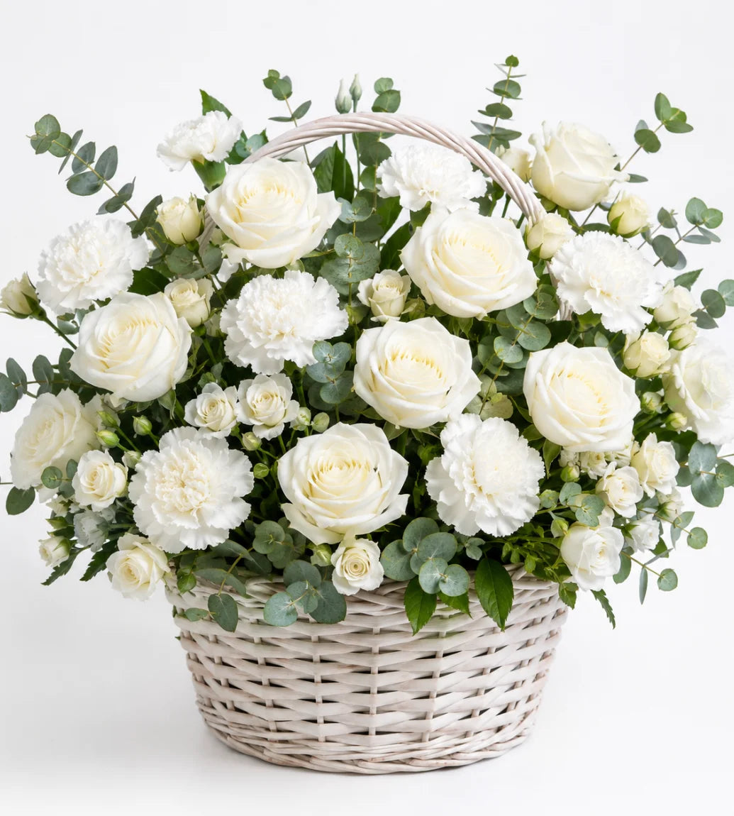 White flower basket arrangement Dubai — condolence flowers delivered by Goshen Flower