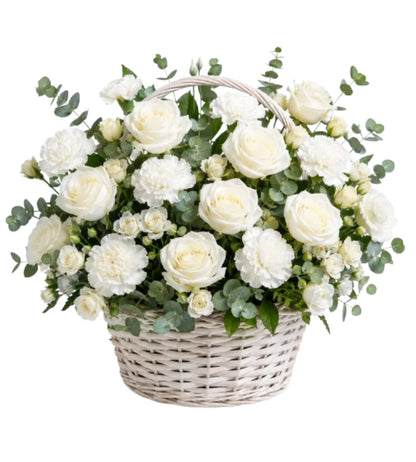 White sympathy flower basket arrangement Dubai — condolence flowers delivered by Goshen Flower